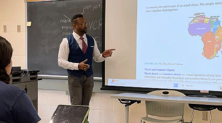 Dr. Colin Campbell teaching a class on cybersecurity